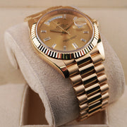 Rolex Day-Date 40 228238 Fluted Bezel Baguette Diamond Champagne Dial
