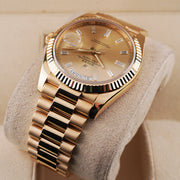 Rolex Day-Date 40 228238 Fluted Bezel Baguette Diamond Champagne Dial