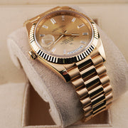 Rolex Day-Date 40 228238 Fluted Bezel Baguette Diamond Champagne Dial